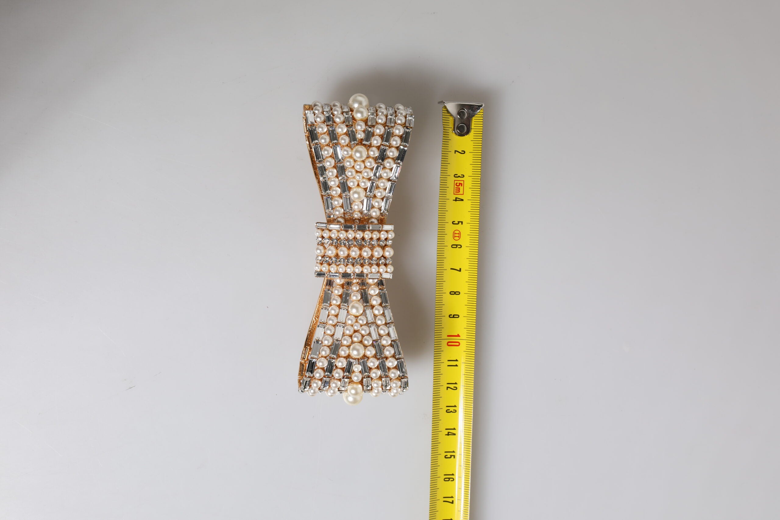 Gold Tone Brass Bow Crystal FauxPearl Embellished Brooch - ventzia